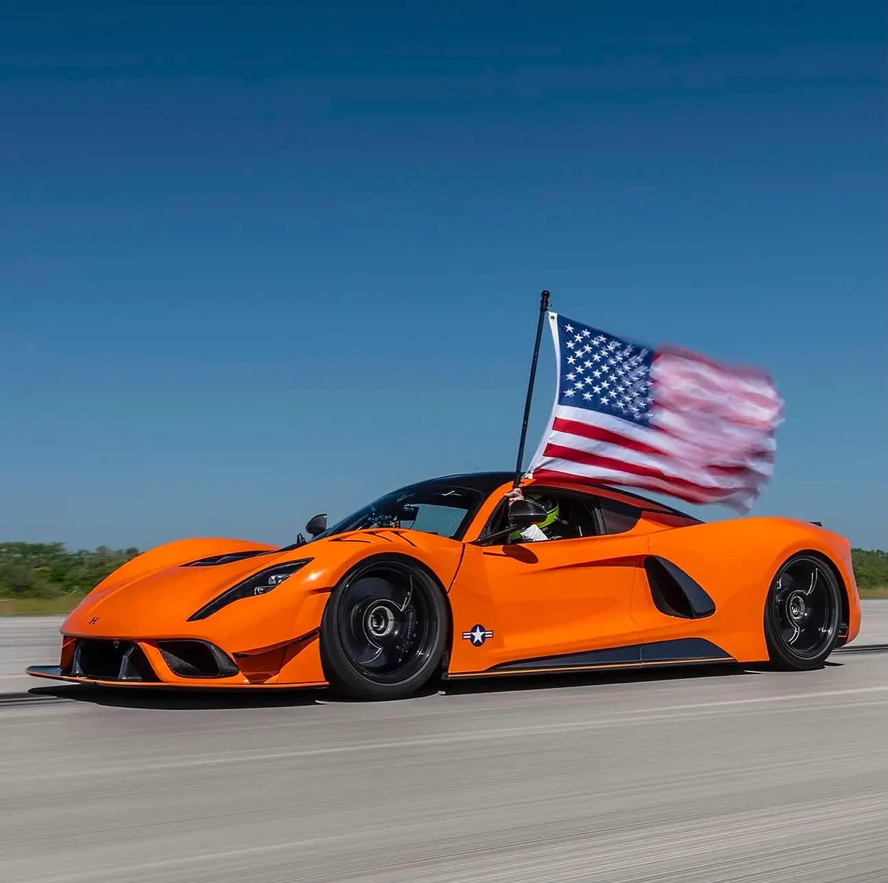 Hennessy supercar with American flag on the Shuttle Landing Facility runway at Kennedy Space Center